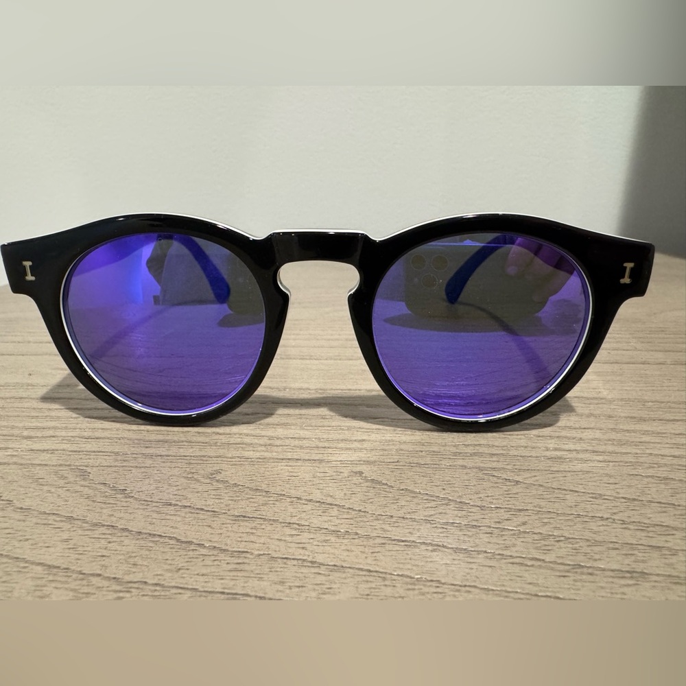Illesteva Leonard Sunglasses
Black with purple lenses